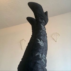 Black thigh high boots